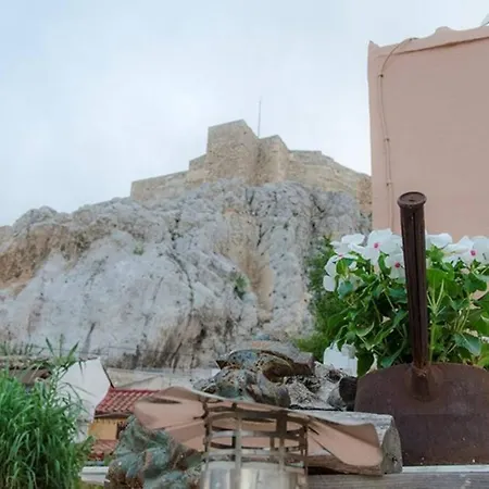 A Small House In A Unique Location Of *